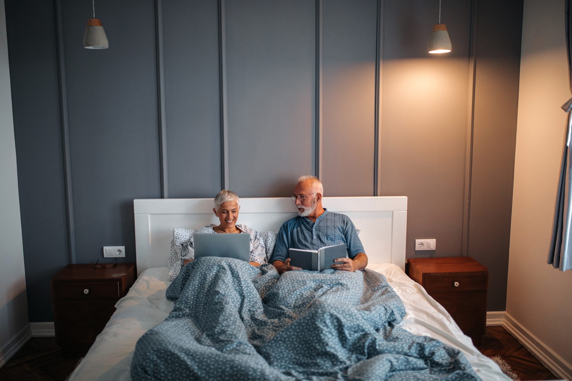 Couple relaxing on their new mattress